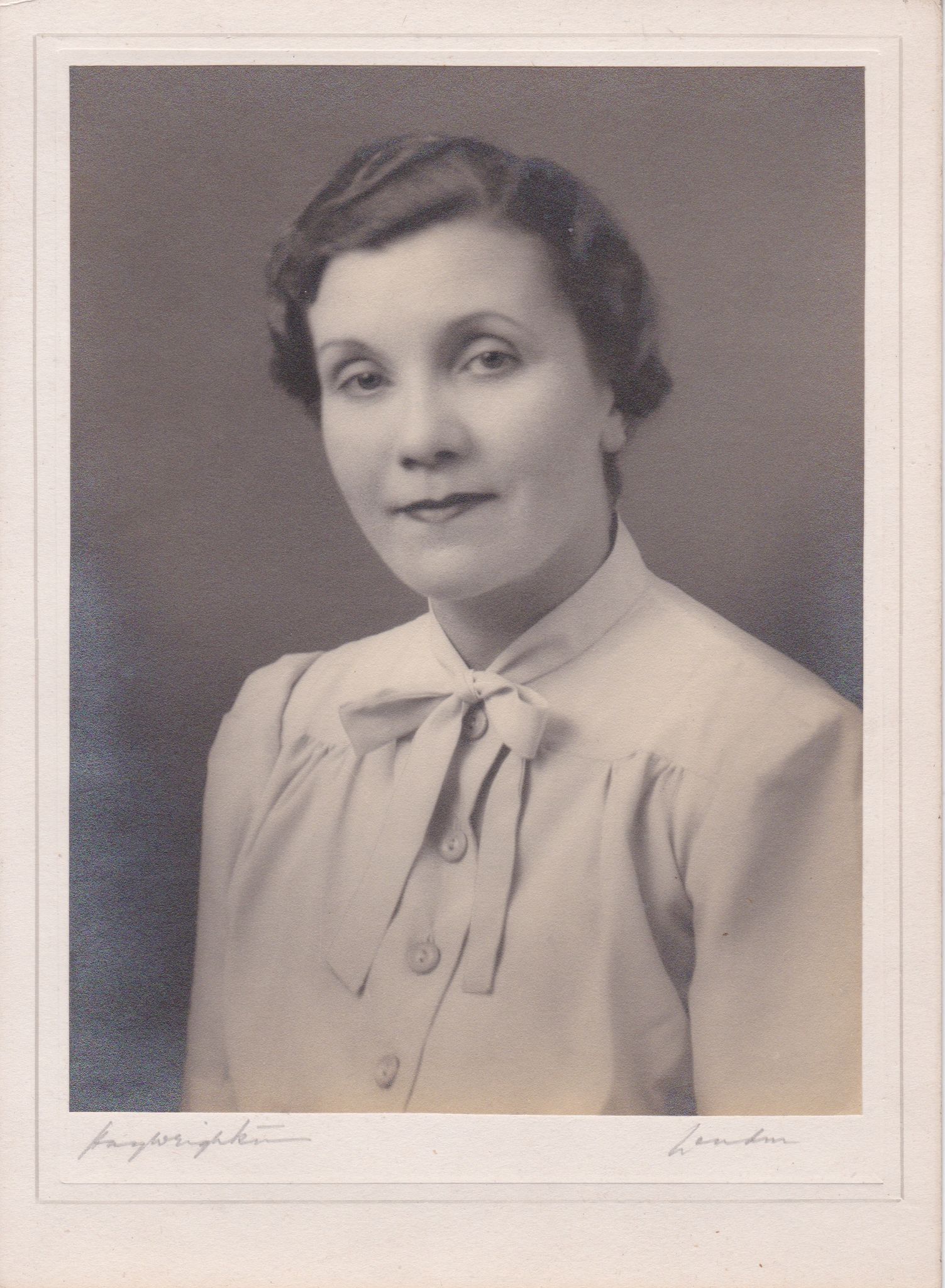 A black and white portrait image of Gertrude Webb.